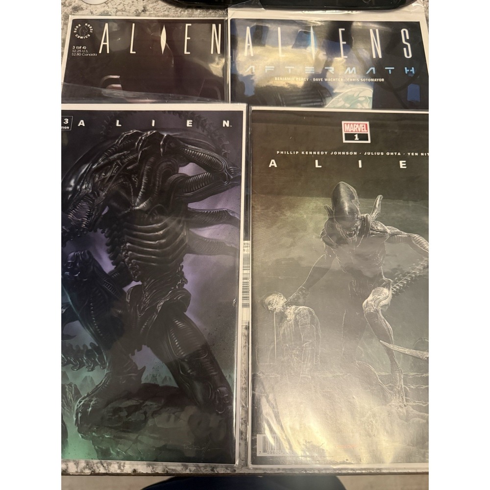 Lot Of 4 Alien Marvel Comic Books EC
